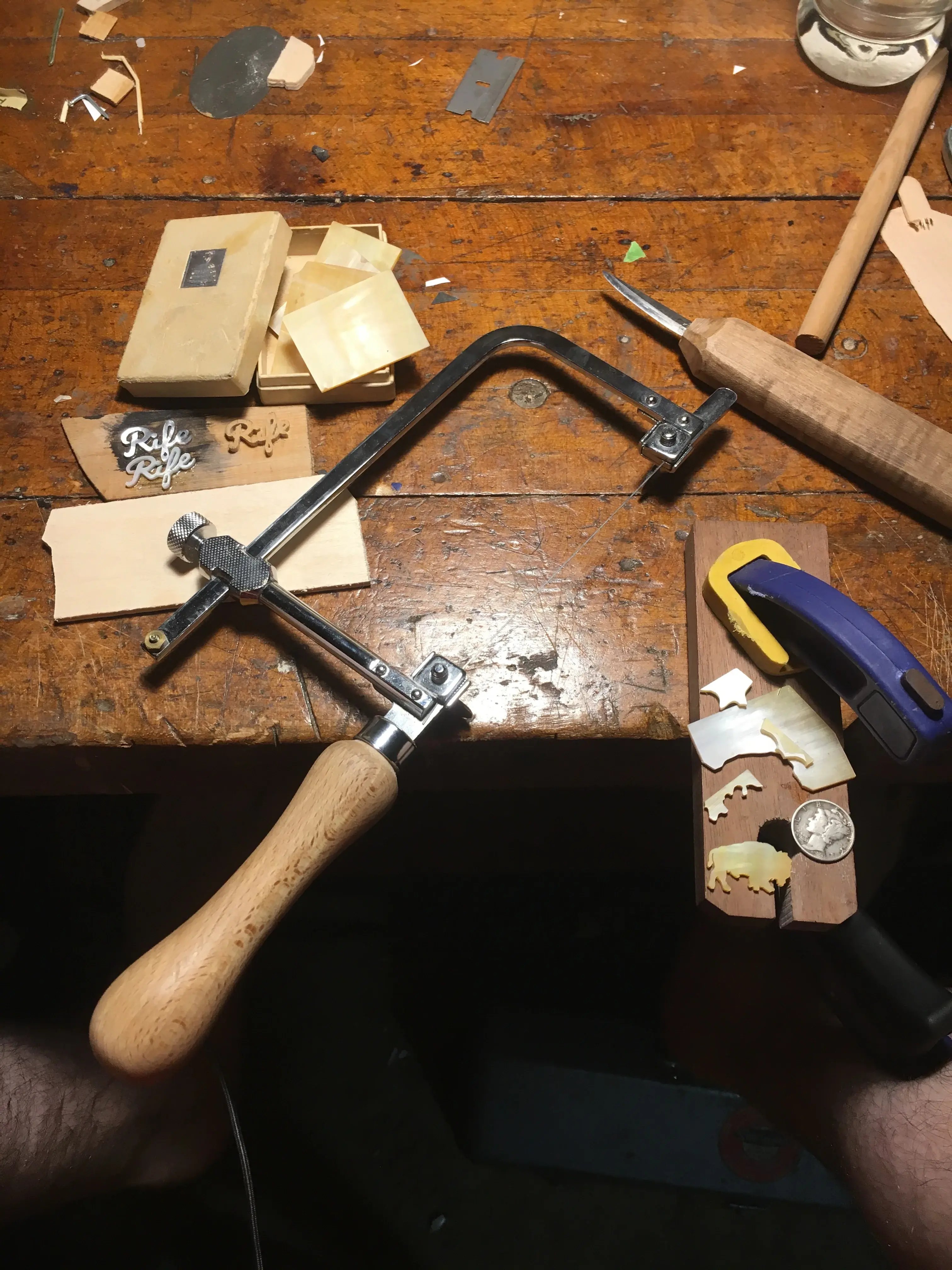 Professional luthier repair tools and workspace